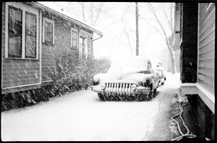 [ 1950s BUICK IN SNOW ]